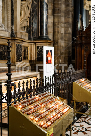 Stand for votive candles in a catholic church 91582932
