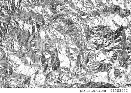 Crumpled silver foil as background, closeup view 91583952
