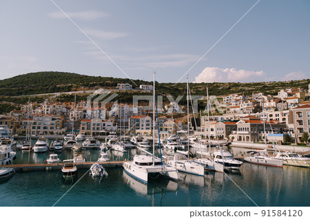 Marina with yachts in Lustica Bay. Montenegro Marina with yachts in Lustica Bay. Montenegro 91584120