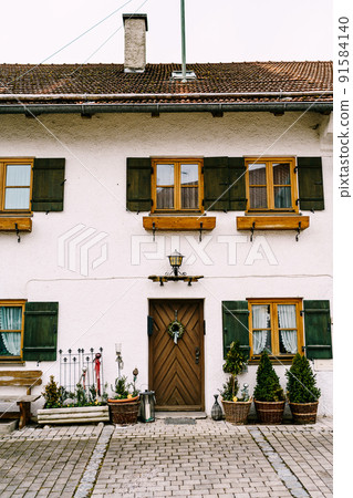 Beautiful facade of a house in the village of Oberammergau. Germany 91584140