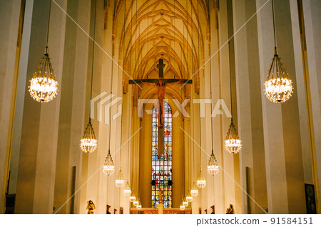 Statue of Jesus Christ on the cross under the arches of the Frauenkirche cathedral. Munich Statue of Jesus Christ on the cross under the arches of the Frauenkirche cathedral. Munich 91584151