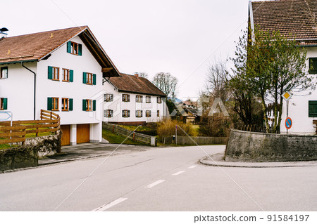 Neat buildings of the village of Oberammergau. Germany 91584197