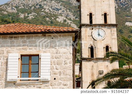 Church of St. Nicholas and a bell tower with a clock. Perast, Montenegro 91584237