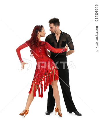 Passionate young couple dancing on white background 91584966