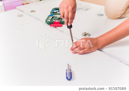 independent and success Bolivian Latin woman assembly and fix repair in moving house independent and success Bolivian Latin woman assembly and fix repair in moving house 91587089