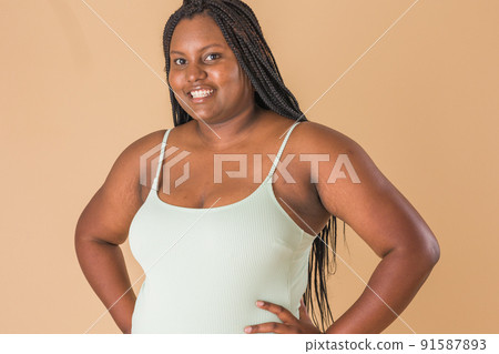 curvy plus size model. overweight body acceptance confidence. Latin Cuban body positive unretouched 91587893