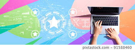 Rating star concept with person using a laptop 91588460