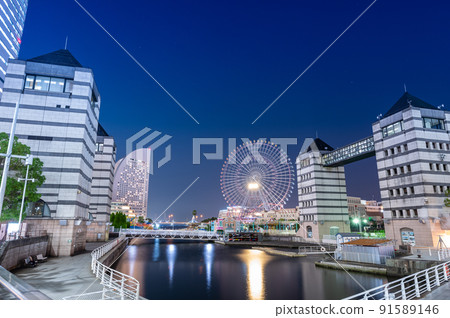Ferris wheel and buildings in Minato Mirai, Yokohama on Power Saving Day | Yokohama City, Kanagawa Prefecture 91589146
