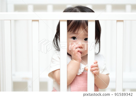 1 year old girl sucking in a crib 1 year old girl sucking in a crib 91589342