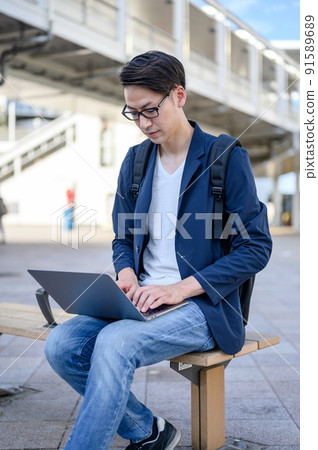 A casual business for men who operate a computer while sitting A casual business for men who operate a computer while sitting 91589689