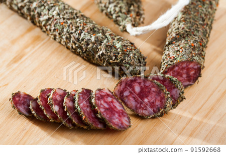 Fuet sausage coated with herbs 91592668