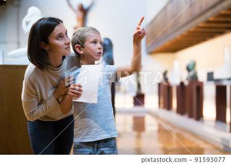 Family visiting historical museum Family visiting historical museum 91593077