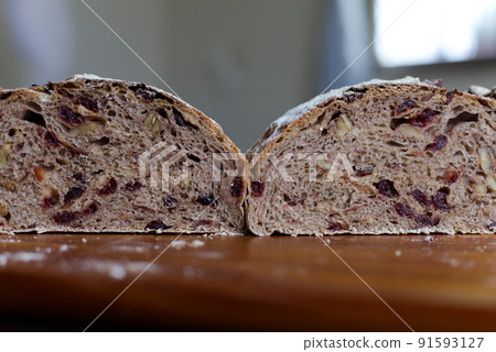 Inside of bread bread handmade whole grain bread with walnuts and cranberries 91593127