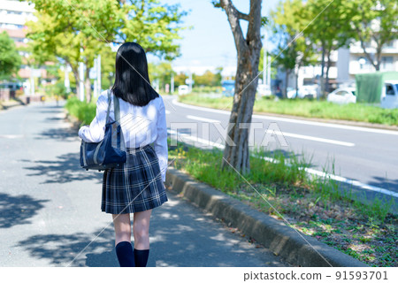 Back view of high school girls going to school in the city, going to and from school, no face 91593701