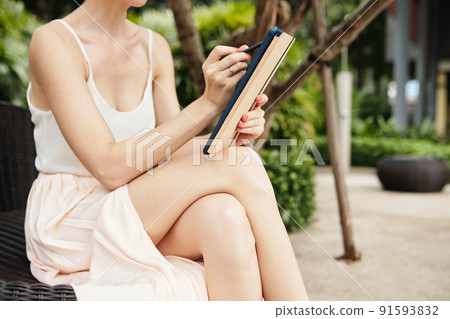Unrecognizable Woman With Digital Tablet 91593832