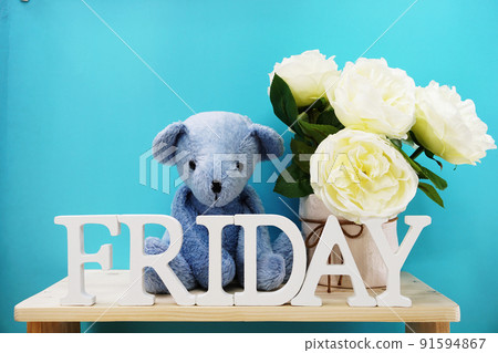 friday word decorative letters on wooden background 91594867