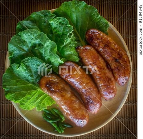Isaan sausage or Thai Northeastern sausage , pork and rice sausages (Sai Krok Isan )  91594948