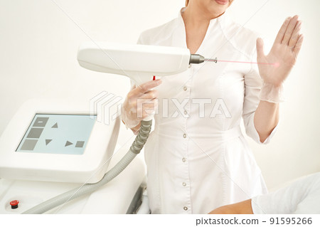 Laser hair removal treatment. Clinic skin care procedure. Medical dermatology 91595266