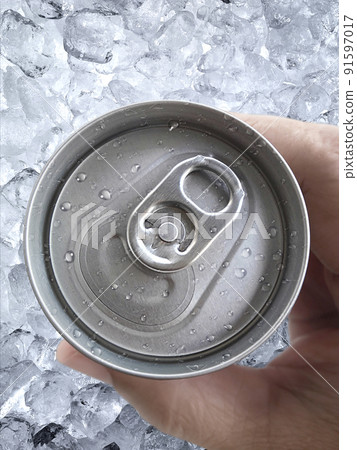 Top view. a man hand holds a cans 91597017