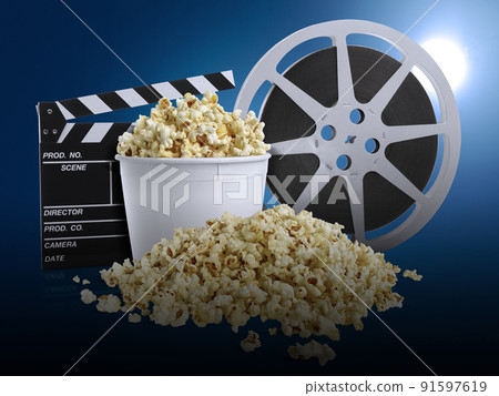 watching movie with popcorn on blue background 91597619