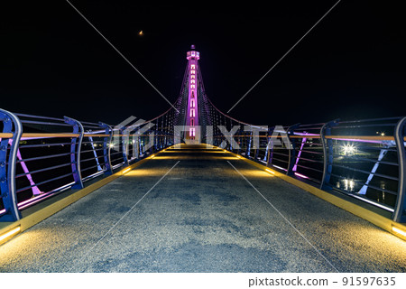 Sculptures and colorful lights on the footbridge Sculptures and colorful lights on the footbridge 91597635