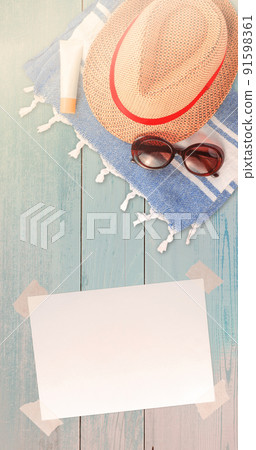Summer Holiday Vacation Trip Mockup Concept Wallpaper with White Blank Free Space Paper Sheet with Adhesive Tape and Straw Hat Towel with Sunglasses and Protection Cream. Summer Holiday Vacation Trip Mockup Concept Wallpaper with White Blank Free Space Paper Sheet with Adhesive Tape and Straw Hat Towel with Sunglasses and Protection Cream. 91598361