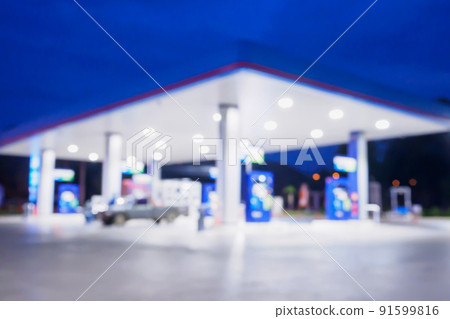 Blur Gas station at night time for background 91599816