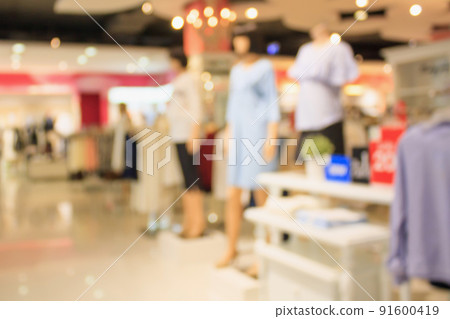 Clothing Boutique display mannequins in fashion shopping mall blur background Clothing Boutique display mannequins in fashion shopping mall blur background 91600419