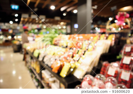 abstract blur organic fresh fruits and vegetable on grocery shelves in supermarket store defocused bokeh light background 91600620