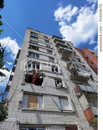 Damaged ruined multi-storey house in Chernihiv near Kyiv on north of Ukraine 91600678