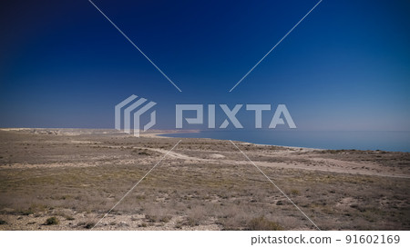 Panorama view to Aral sea from the rim of Plateau Ustyurt near Aktumsuk cape , Karakalpakstan, Uzbekistan 91602169