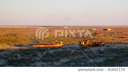Panorama of ship cemetery at sunset near Moynaq, Karakalpakstan, Uzbekistan Panorama of ship cemetery at sunset near Moynaq, Karakalpakstan, Uzbekistan 91602174