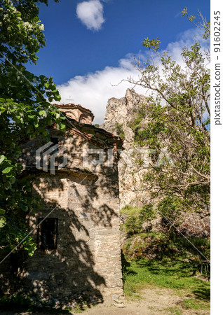 Exterior view to St. Nicola Shishevski monastery at the mountains above Matka Canyon, North Macedonia 91602245
