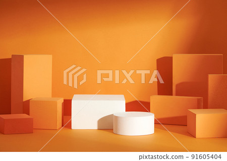 Front view of white and orange podium with and flower in a orange background for advertising , abstract content Front view of white and orange podium with and flower in a orange background for advertising , abstract content 91605404