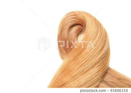 Lock of female hair isolated on white background Lock of female hair isolated on white background 91606158