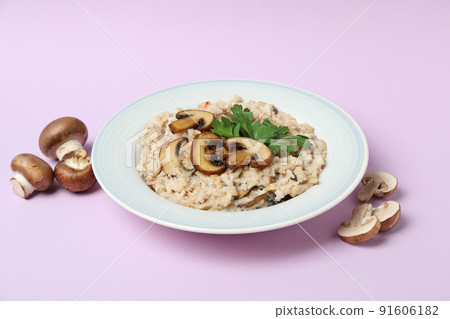Concept of tasty food with risotto with mushrooms 91606182