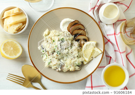 Concept of tasty food with risotto with mushrooms, top view Concept of tasty food with risotto with mushrooms, top view 91606184
