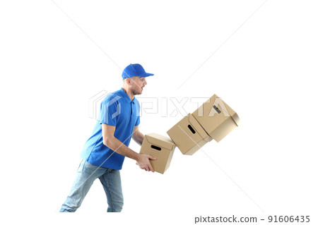 Delivery man with falling boxes, isolated on white background 91606435