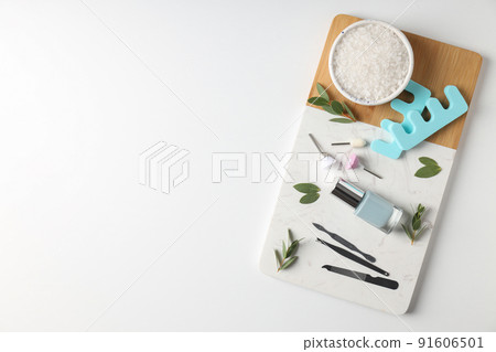 Concept of nail care with manicure accessories on white background 91606501