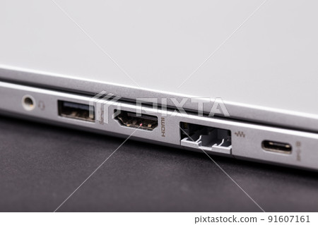 Sign ndmi on a gray laptop case close-up. 91607161