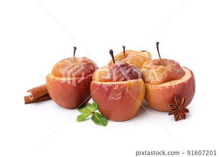 Stuffed baked apples isolated on white background Stuffed baked apples isolated on white background 91607201