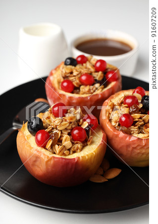 Concept of tasty food with baked apples, close up Concept of tasty food with baked apples, close up 91607209