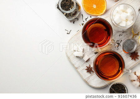 Concept of hot drink with tea on white background Concept of hot drink with tea on white background 91607436