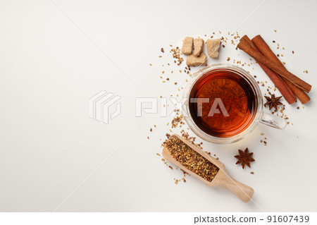 Concept of hot drink with tea on white background Concept of hot drink with tea on white background 91607439