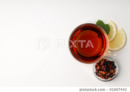 Concept of hot drink with tea on white background Concept of hot drink with tea on white background 91607442