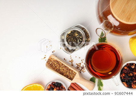 Concept of hot drink with tea on white background Concept of hot drink with tea on white background 91607444