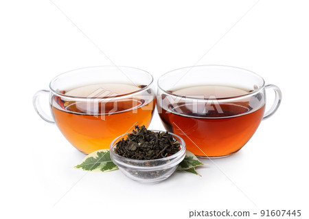 Concept of hot drink with tea isolated on white background Concept of hot drink with tea isolated on white background 91607445