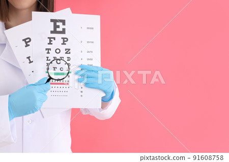 Female ophthalmologist on pink background, space for text Female ophthalmologist on pink background, space for text 91608758