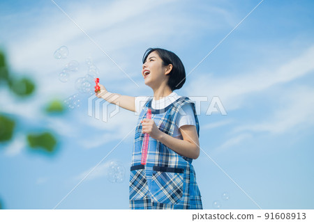 Nursery teacher blue sky Nursery teacher blue sky 91608913