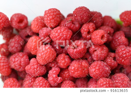 A lot of ripe rashberries as a close up A lot of ripe rashberries as a close up 91613635